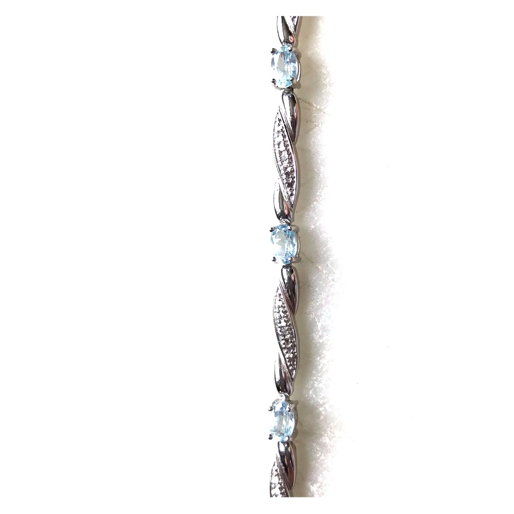 Sterling silver bracelet with blue zircon stones